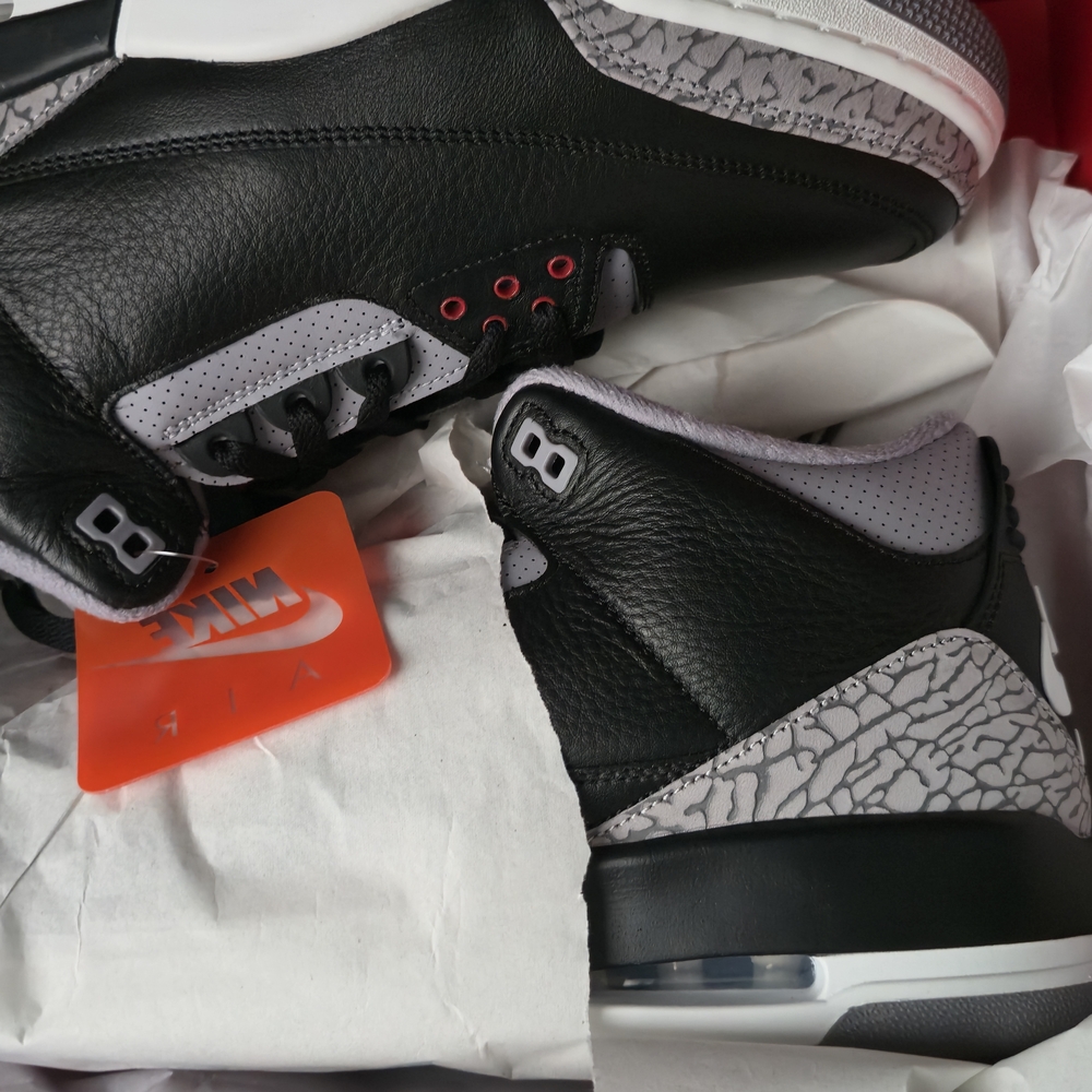 Nike Black and Gray Sneakers with Retro Design